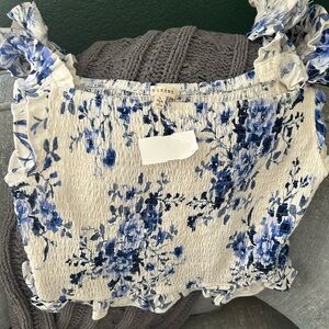 Blue and white Floral set from Frock Candy. NWT. Size L